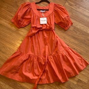 Olivia James: Anna - coral cotton spring prairie dress w/ puff sleeves